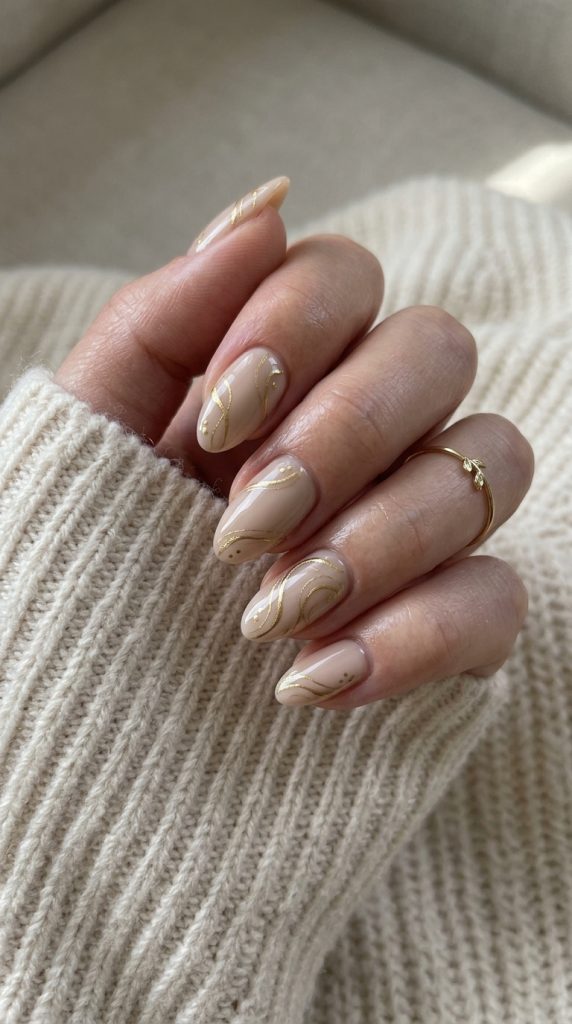 Nude Nails With Gold Swirls